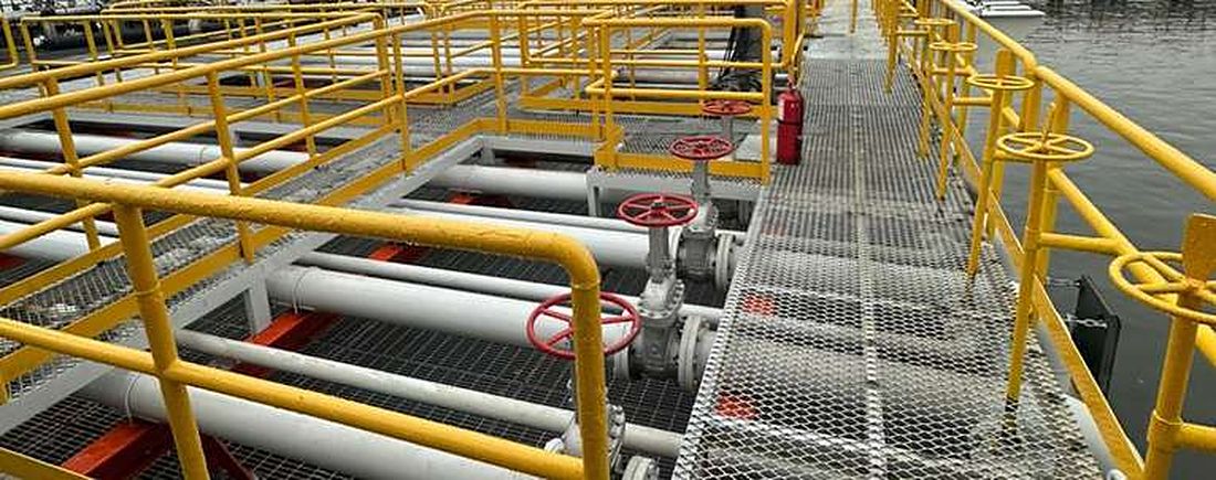 Pipelines with yellow handrails