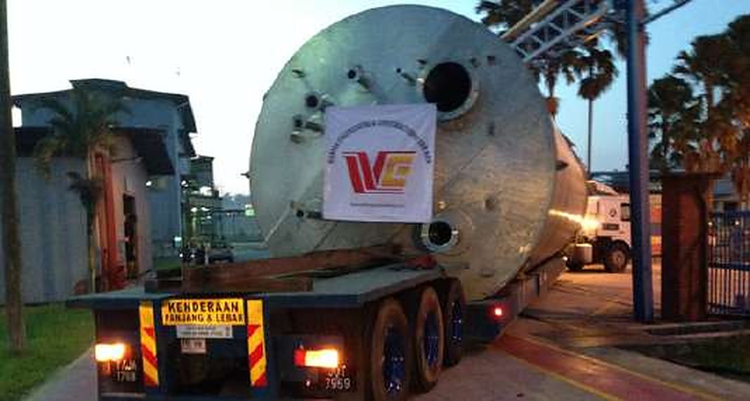 Stainless steel tank delivered on a low loader