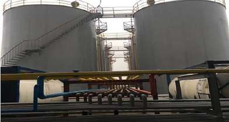 Painted storage tanks with platforms